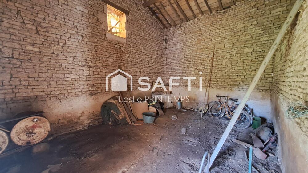 Grange à rénover sur 1500 m² de terrain constructible