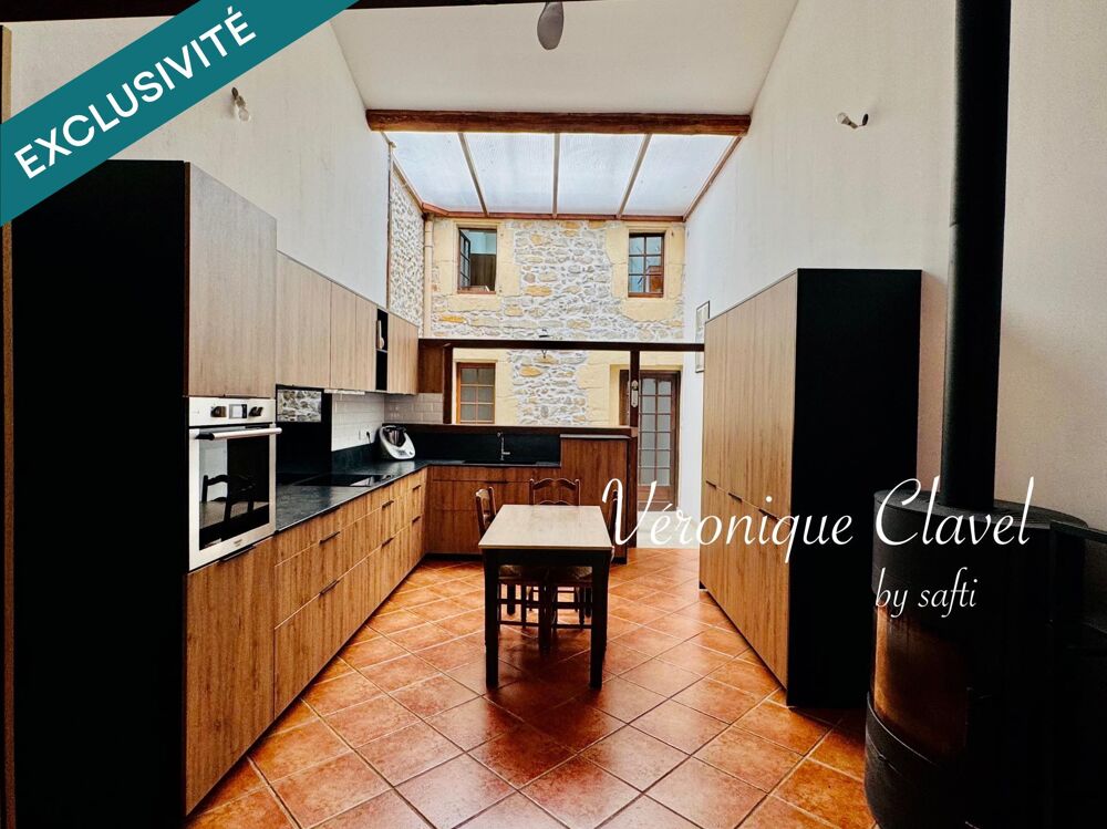 Vente Maison Maison de village  en pierre apparentes de 109m2 récemment rénovée avec patio et Garage de 40m2 Cardet