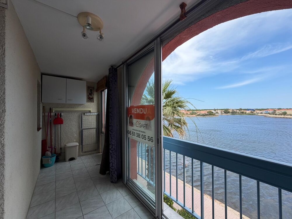 Appartement T2 avec loggia, parking et vue sur létang