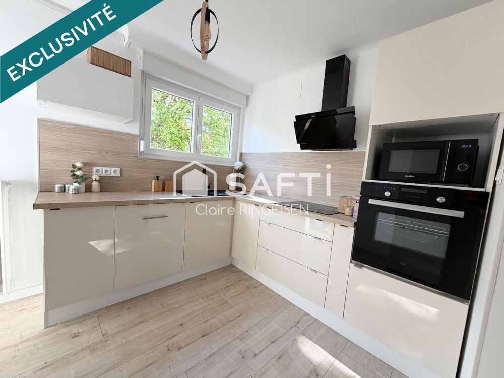 Appartement rénové de 89m2 avec terrasse, cave et garage