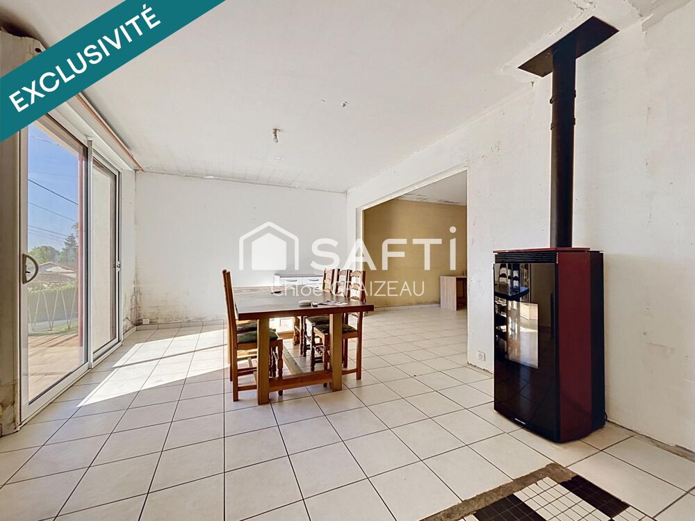 Maison sur demi-sous-sol, 84 m² habitables, terrain constructible