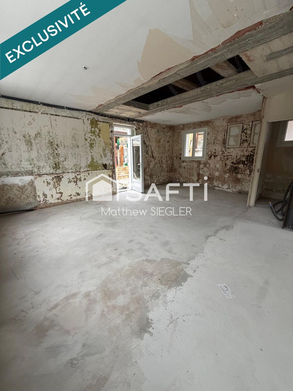 Maison de 80 m² avec 2 chambres, dépendance, atelier et 2 garages, dont un de 40 m² : un bien plein de potentiel pour réaliser v