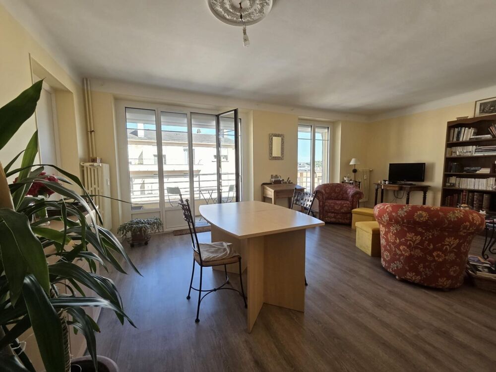 Bel appartement lumineux au calme avec balcon, jardin, caves et garage à proximité des commodités