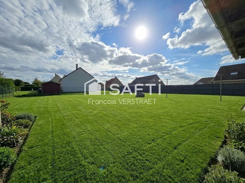 Maison individuelle de plain pied , garage , grand jardin
