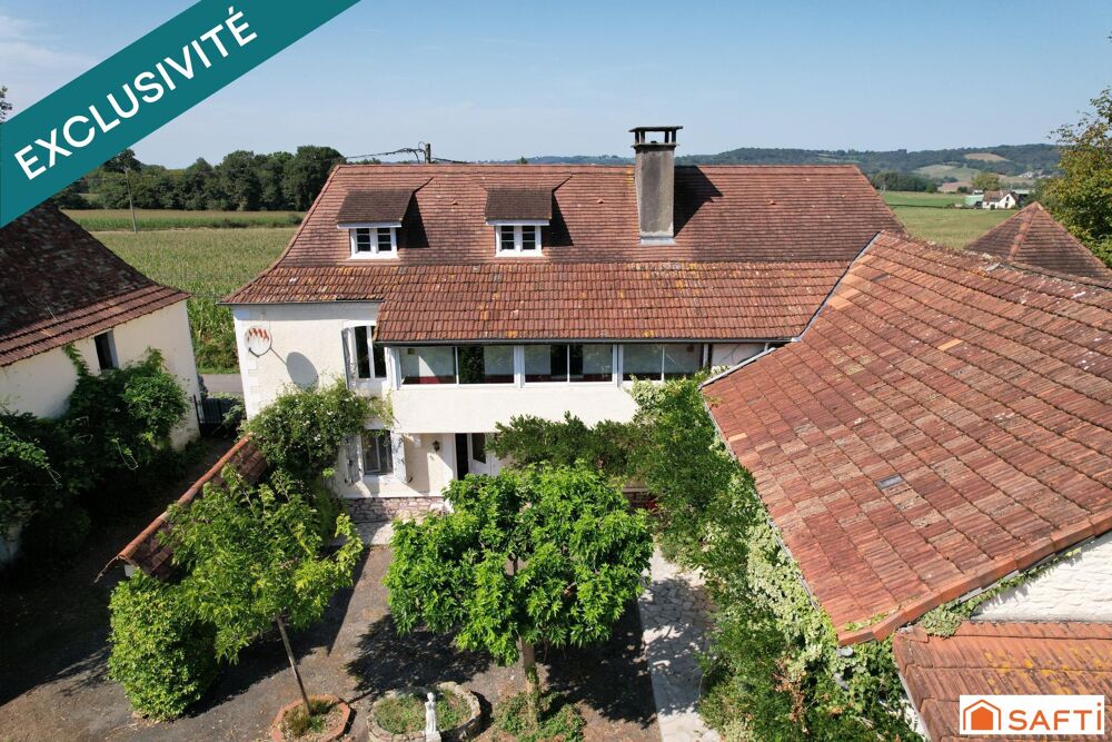 Authentique Béarnaise 213M2 avec dépendances et jardin à langlaise