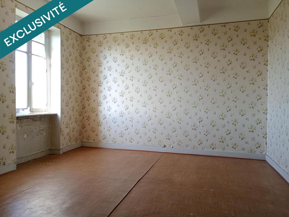 Appartement dans immeuble de ville 1er étage à rénover
