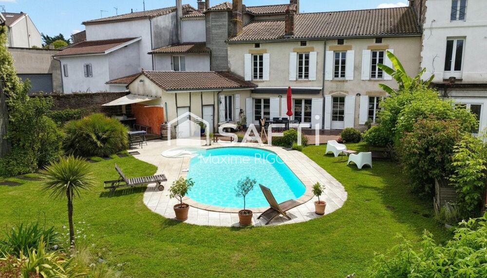 Maison avec jardin et piscine en centre-ville