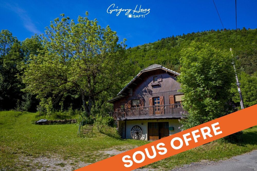 Chalet avec terrain, garage et abris bois