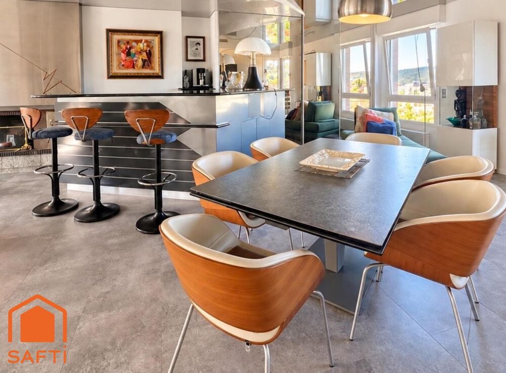 Superbe appartement avec terrasses, 2 caves et garage