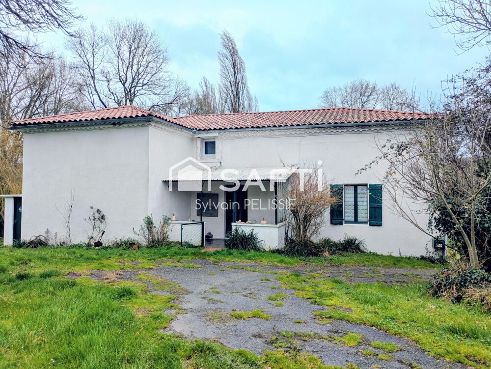 Ferme de caractère avec dépendances et beau potentiel