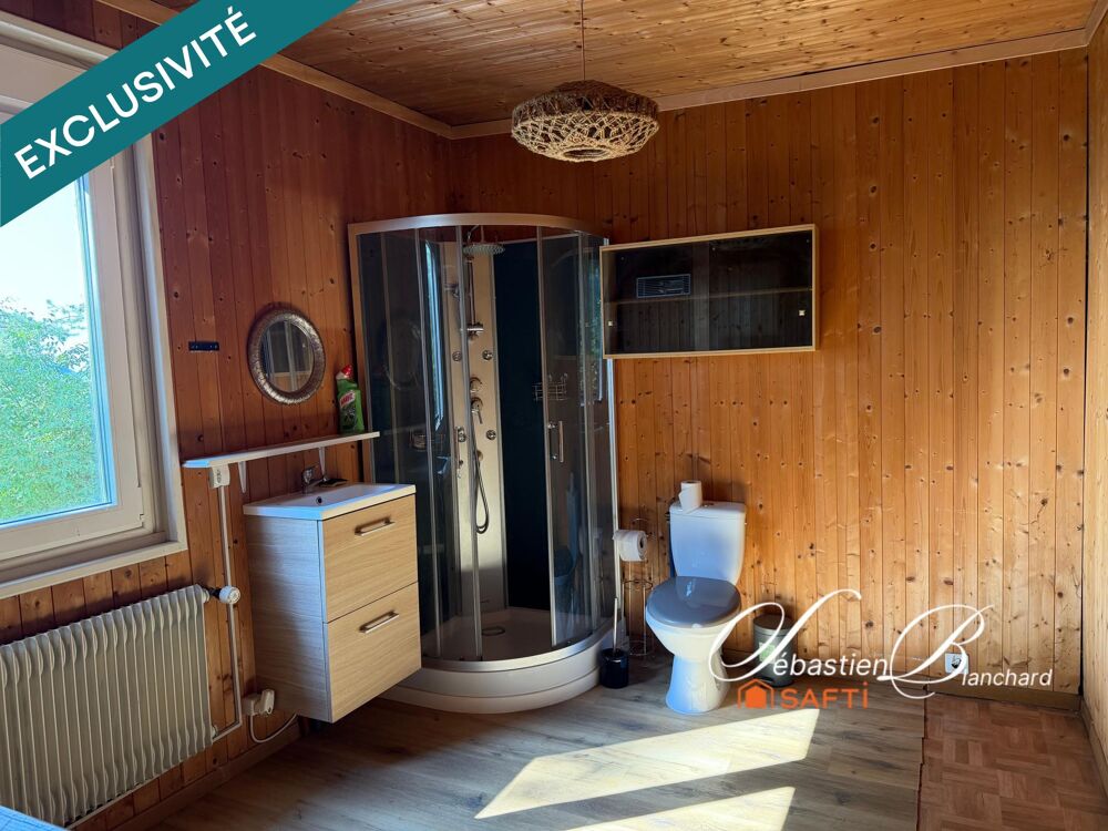 Maison mitoyenne avec beau terrain de 825 m²  à personnaliser