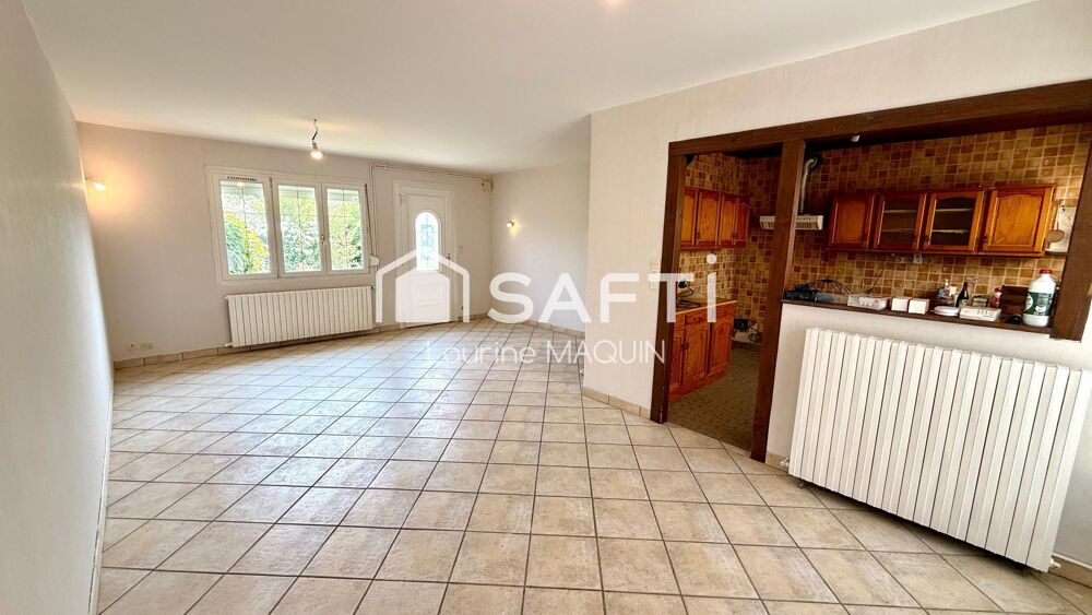 Maison plain pied disposant de trois chambres