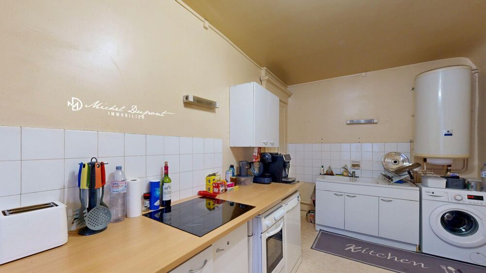 Appartement de 83 m² avec surface commerciale vitrée