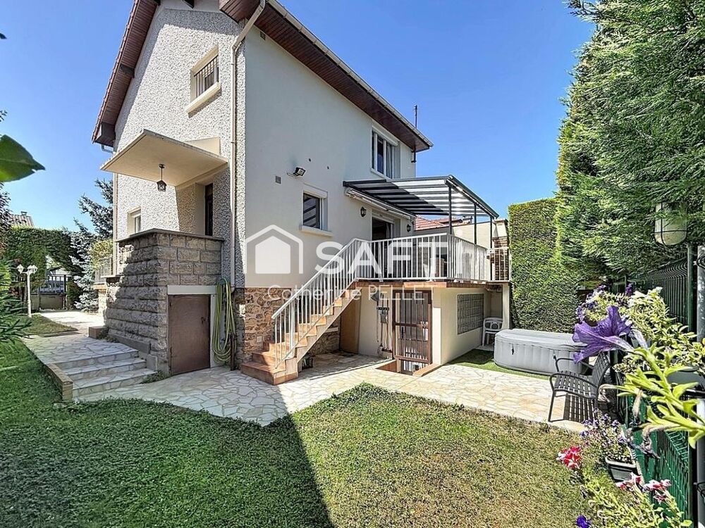 Maison familiale sans travaux avec garage 3 véhicules et jardin arboré