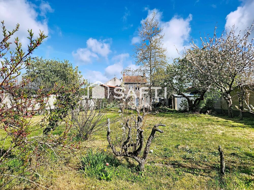 Fort potentiel pour cet ensemble immobilier comprenant une maison ancienne et un terrain constructible