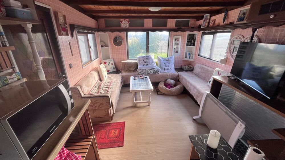Vente Terrain Mobil home avec assainissement, garage et jardin Les adjots