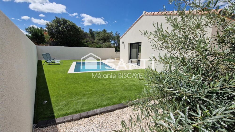 MAISON DE PLAIN PIED AVEC PISCINE GARAGE ET SOUS-SOL