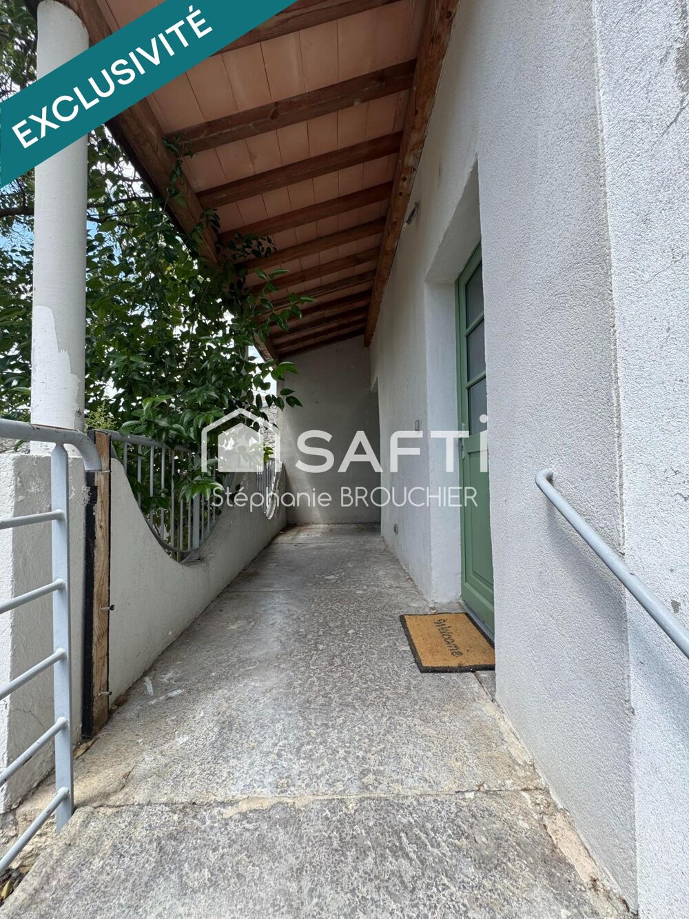 Appartement avec cave terrasse cour et local commercial