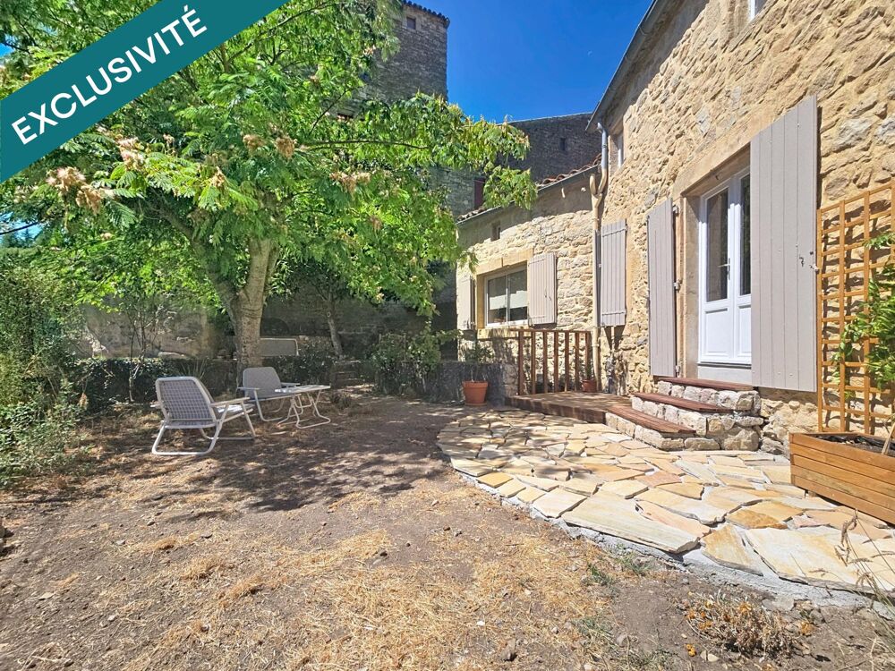 Un véritable bijou au coeur de Boussagues : pierre, bois, vue dominante et jardin au pied du château pour une maison au charme ab