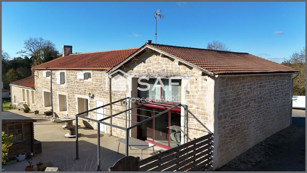Propriété rénovée avec studio et maison à rénover