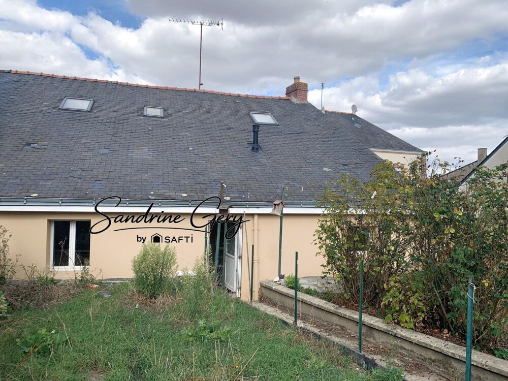Maison de village avec trois chambres, jardin clos, ravalement récent et poêle à granulés. Un intérieur à réagencer selon vos en