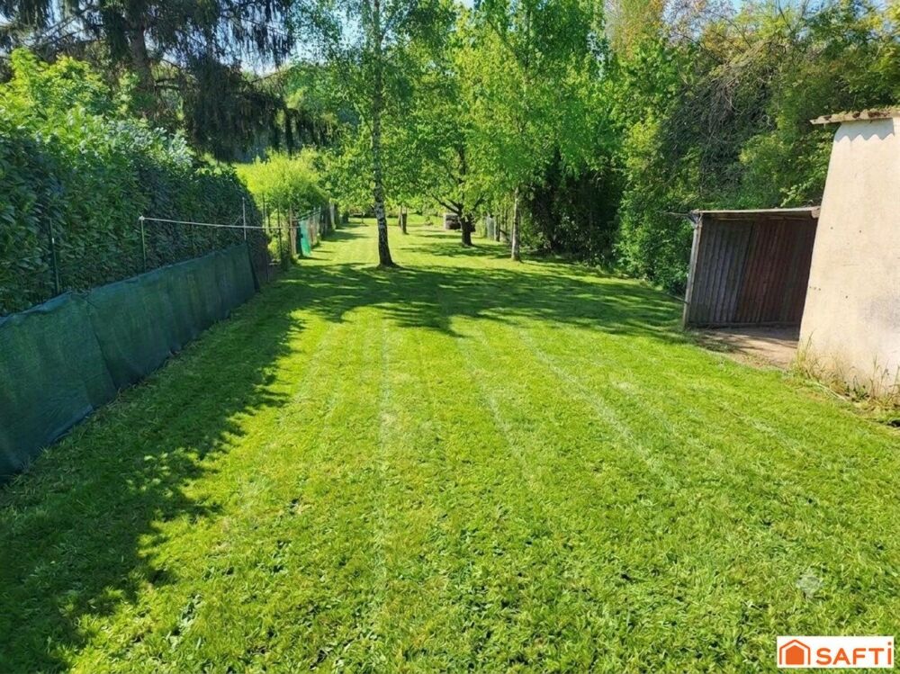 Maison 3 pièces de 50 m² avec terrain de 615 m² et dépendances