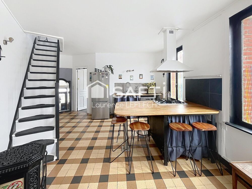 Beaux volumes et charme pour ce bien atypique