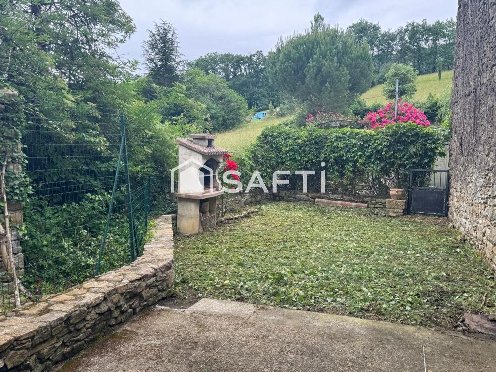 MAISON DE VILLAGE AVEC UN JARDIN
