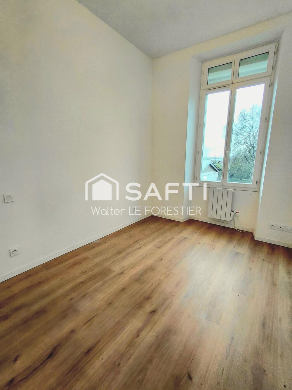 APPARTEMENT T3 RENOVE AVEC JARDIN ET PLACE DE PARKING