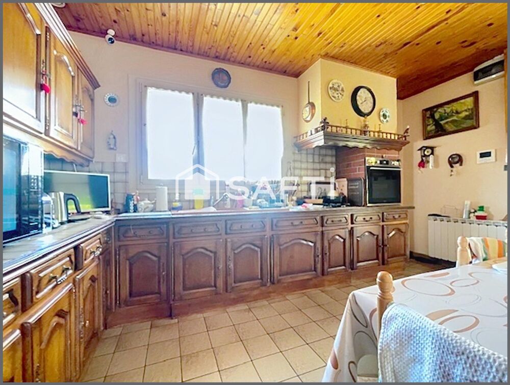 MAISON DE PLAIN PIED AVEC JARDIN