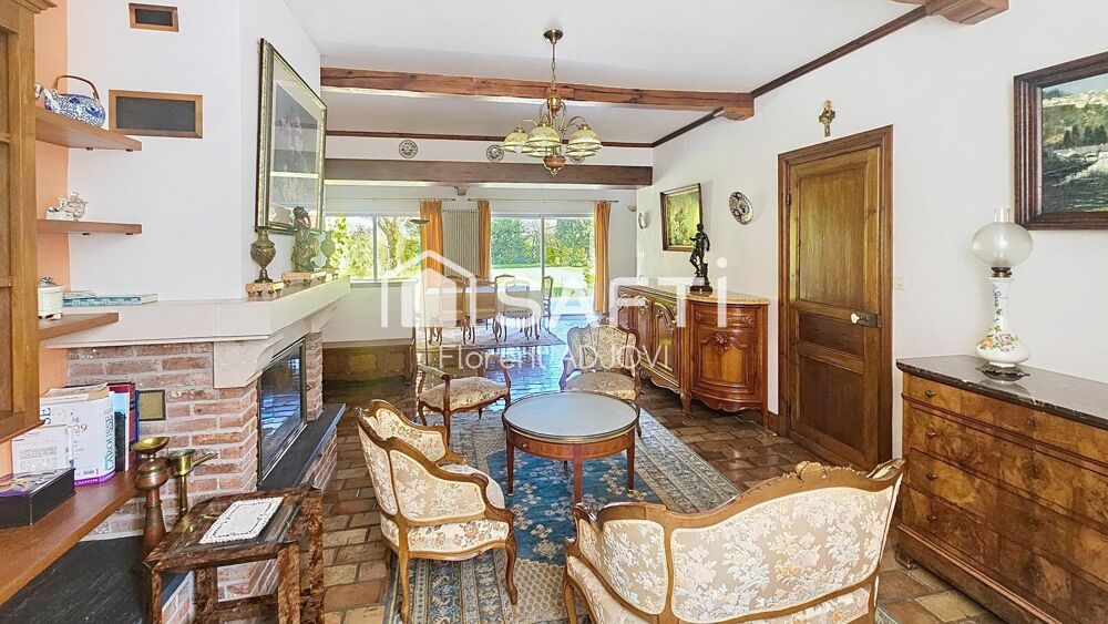 Laissez vous séduire par cette élégante maison de maitre plain pied alliant charme, volumes généreux et cadre de vie paisible