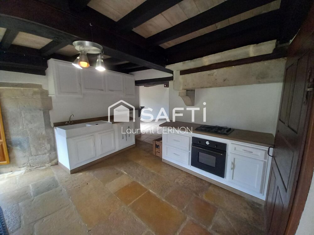 MAISON ANCIENNE AVEC TOUR DE 130 M²
