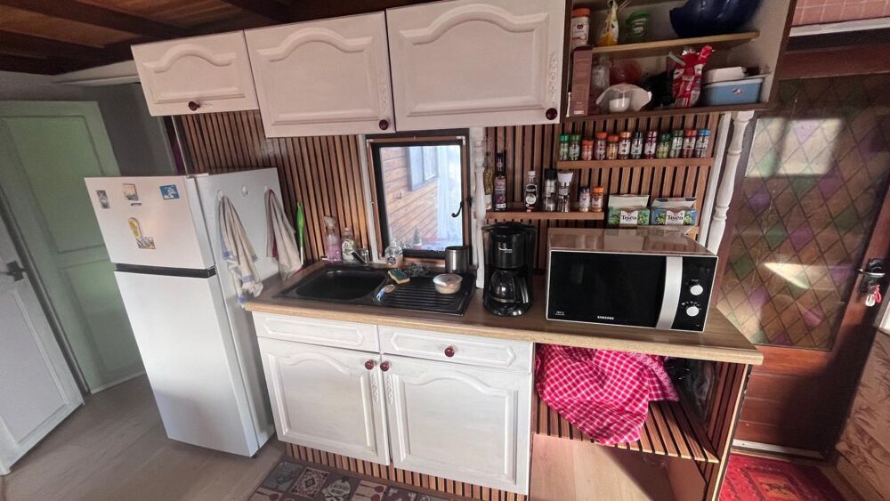Vente Terrain Mobil home avec assainissement, garage et jardin Les adjots