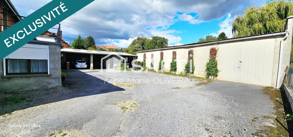 Vente Immeuble Immeuble 430 m2 comprenant : 7 lots ( 6 apparts + un atelier de 150m2 ) une cour, offrant un bon investissement en gestion libre Chauny