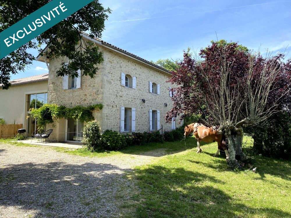 Jolie maison en pierre à rénover de 245m2 10 pièces sur 1,98 hectare de terrain
