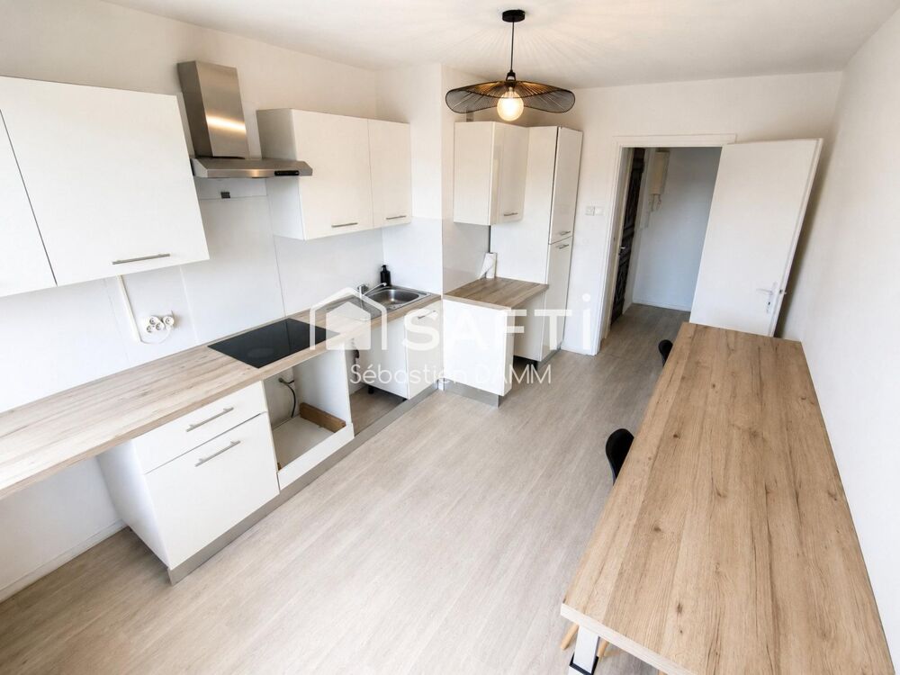 MULHOUSE  Appartement 3 pièces de 75 m²  Dernier étage avec ascenseur  2 balcons  Garage  Cave
