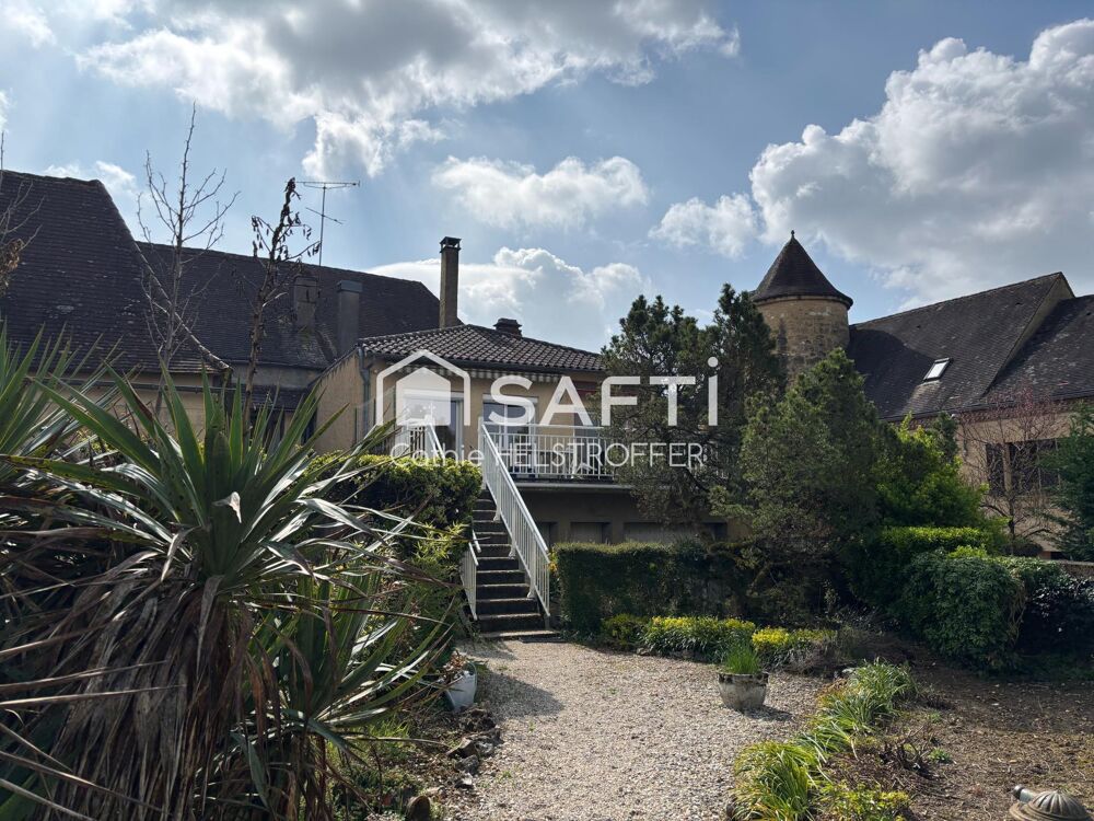 Maison T5 + studio + local commercial avec vitrine + espace stockage