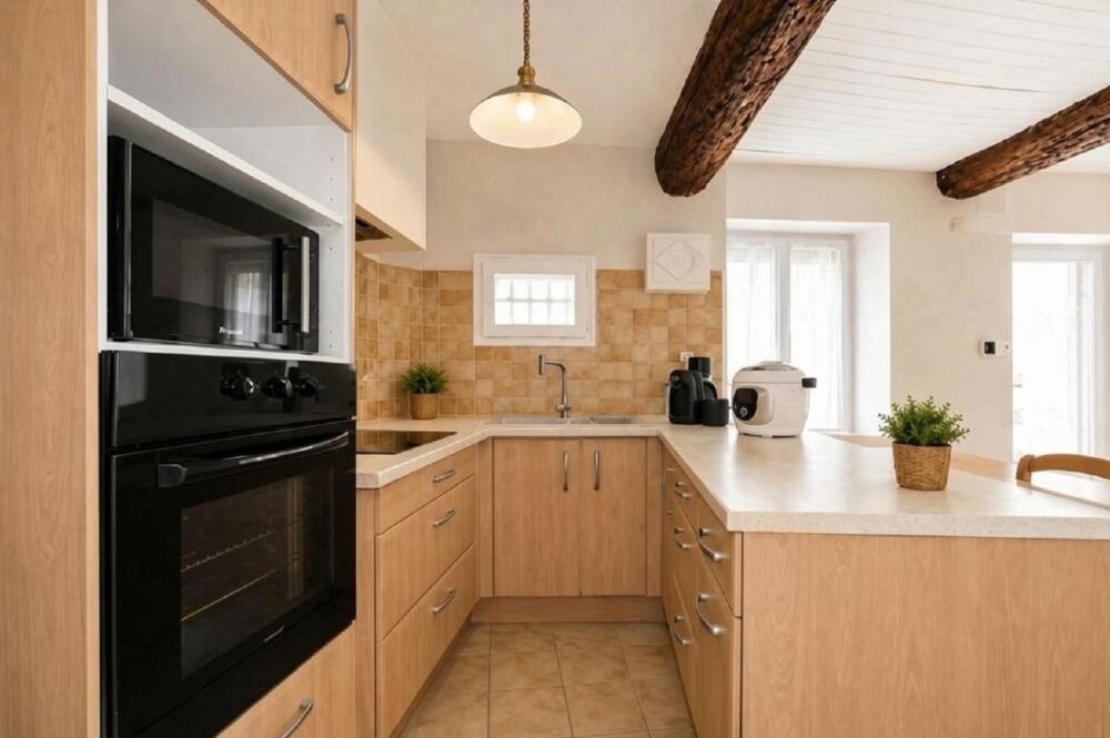 Vente Maison Maison de village climatisée R+2  2 chambres + bureau Canet