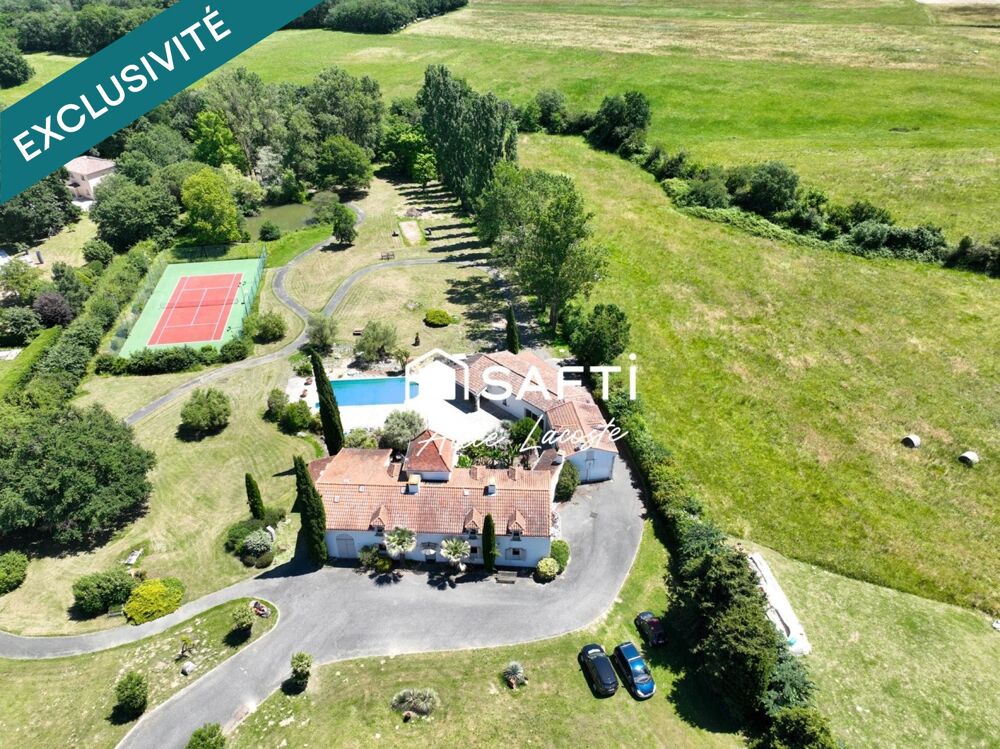 Propriété avec parc, piscine, tennis et étang