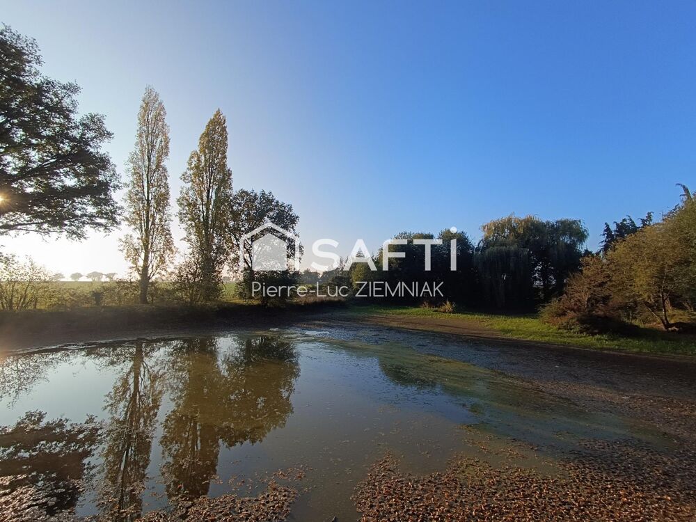 Vente Terrain Terrain de loisirs avec étang et mobil-home – 4100 m² clos à Houssay (53360) Houssay