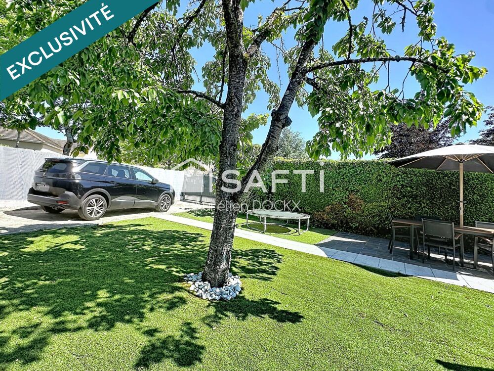 Spacieuse maison avec garage et agréable jardin