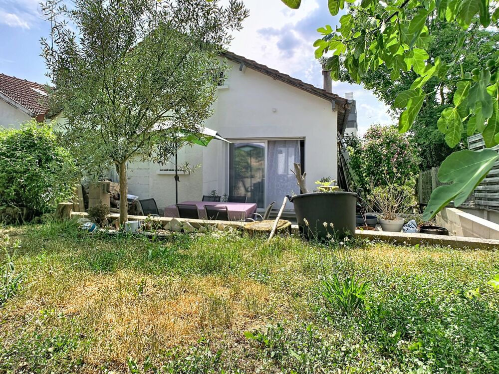 Maison sur sous sol avec jardin