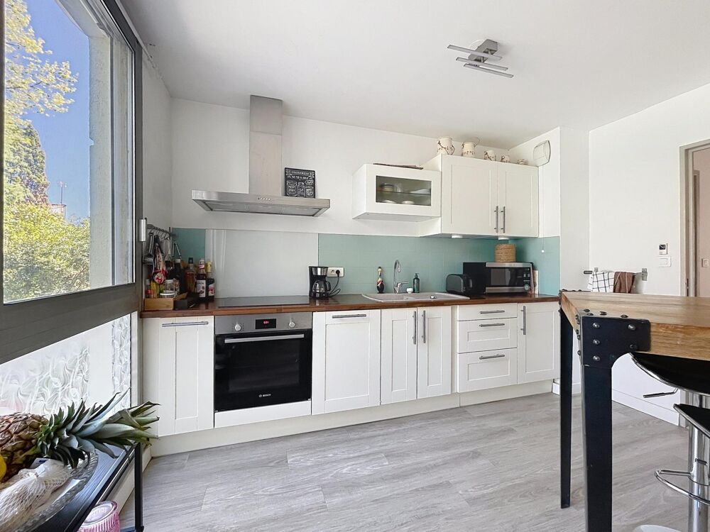 T3 EN RESIDENCE ARBOREE TERRASSE ET PARKING