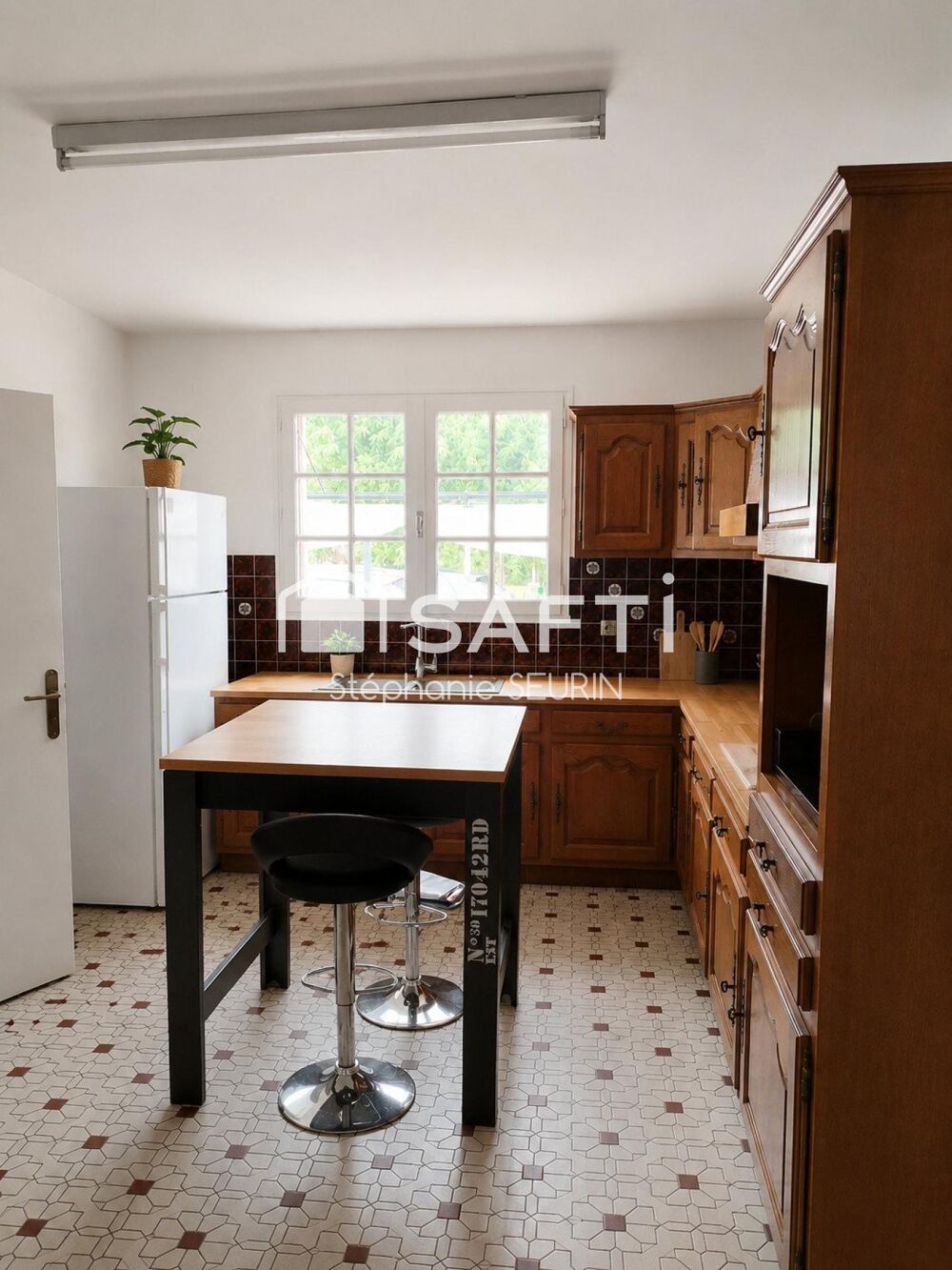 maison ,2 garages, cellier, 3 chambres