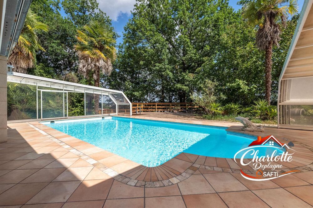 Maison traditionnelle avec piscine