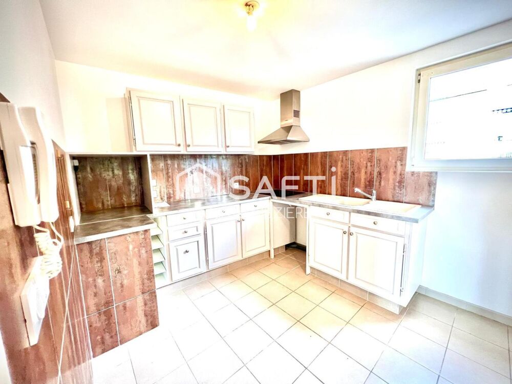 Maison de ville (2 beaux appartements;1 loué); terrasse.