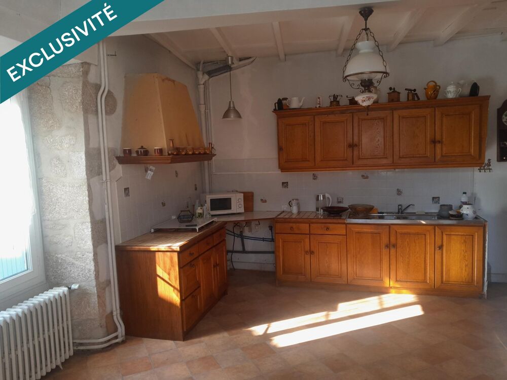 MAISON EN PIERRE AVEC GARAGE ET STATIONNEMENT