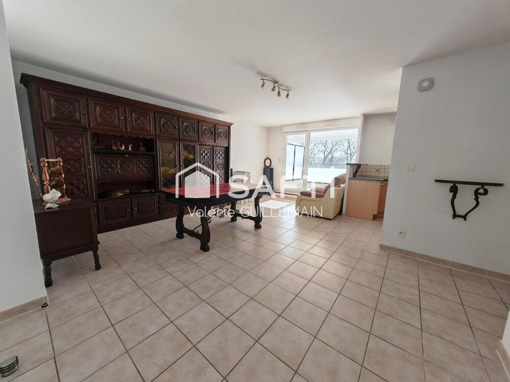 Appartement T4 de 77m² + double garage + place extérieure