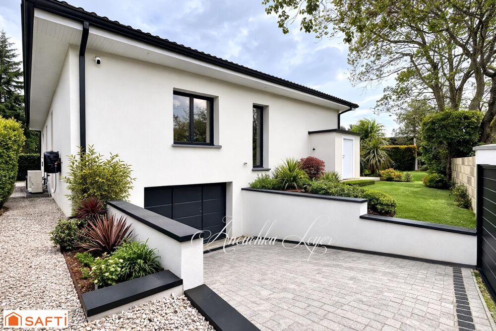 Maison avec garage et piscine au calme