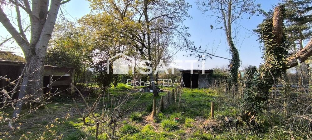 Maison ancienne avec terrain et garage